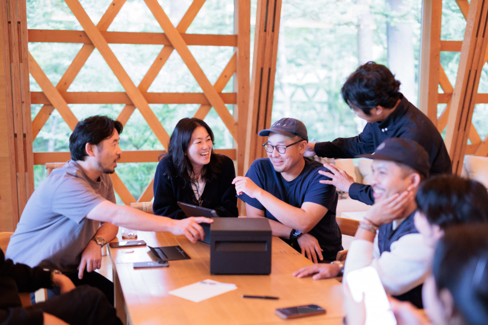 With just a few hours to go, the chefs gather around the table to discuss their collaboration dinner menu