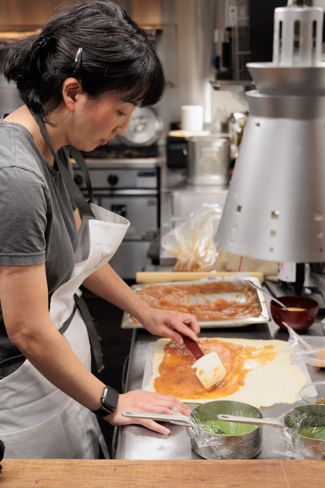 Chef Genie Kwon preparing her apple galette
