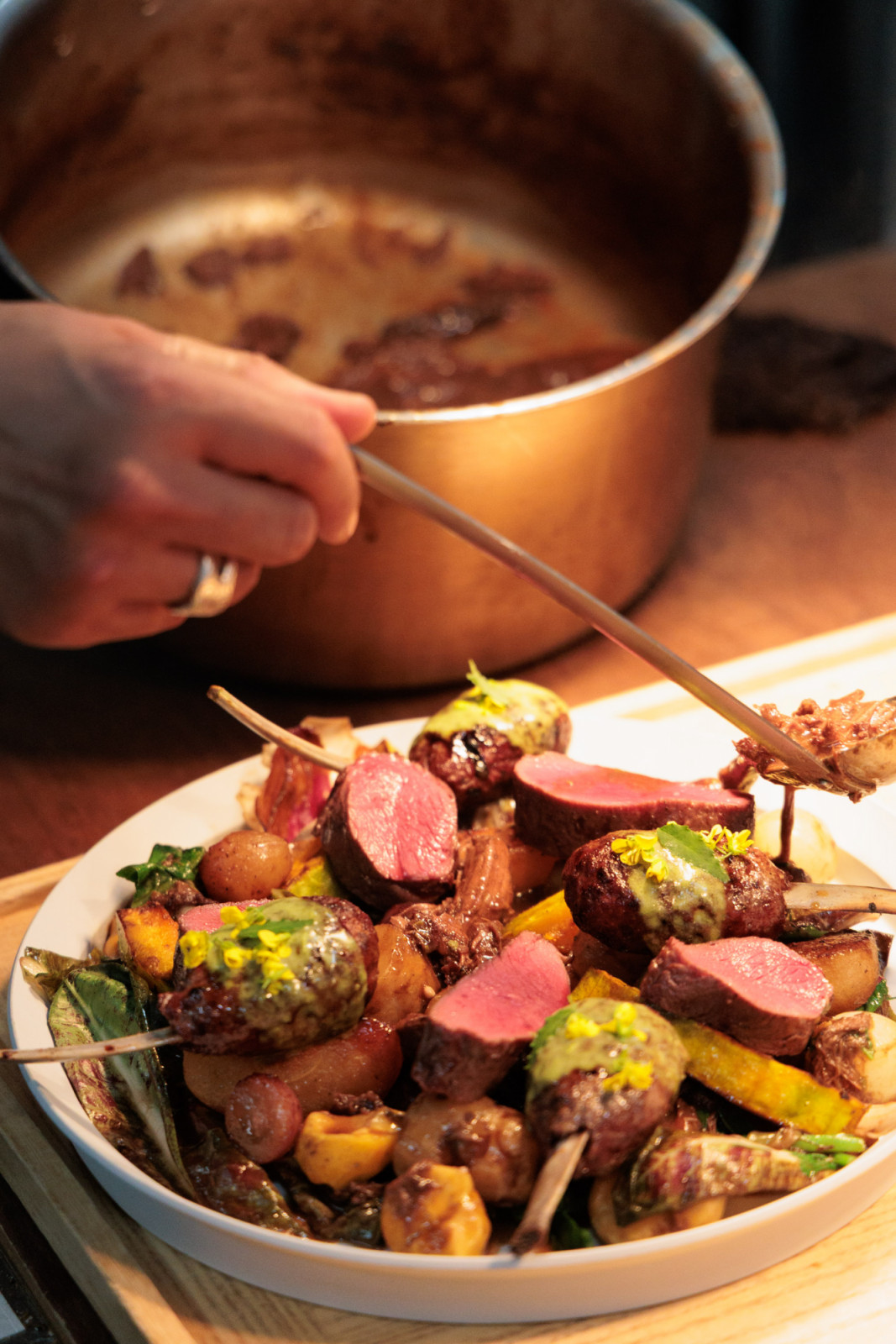 Laid over a bed of veggies, the venison was bathed in a sauce of red wine and venison jus