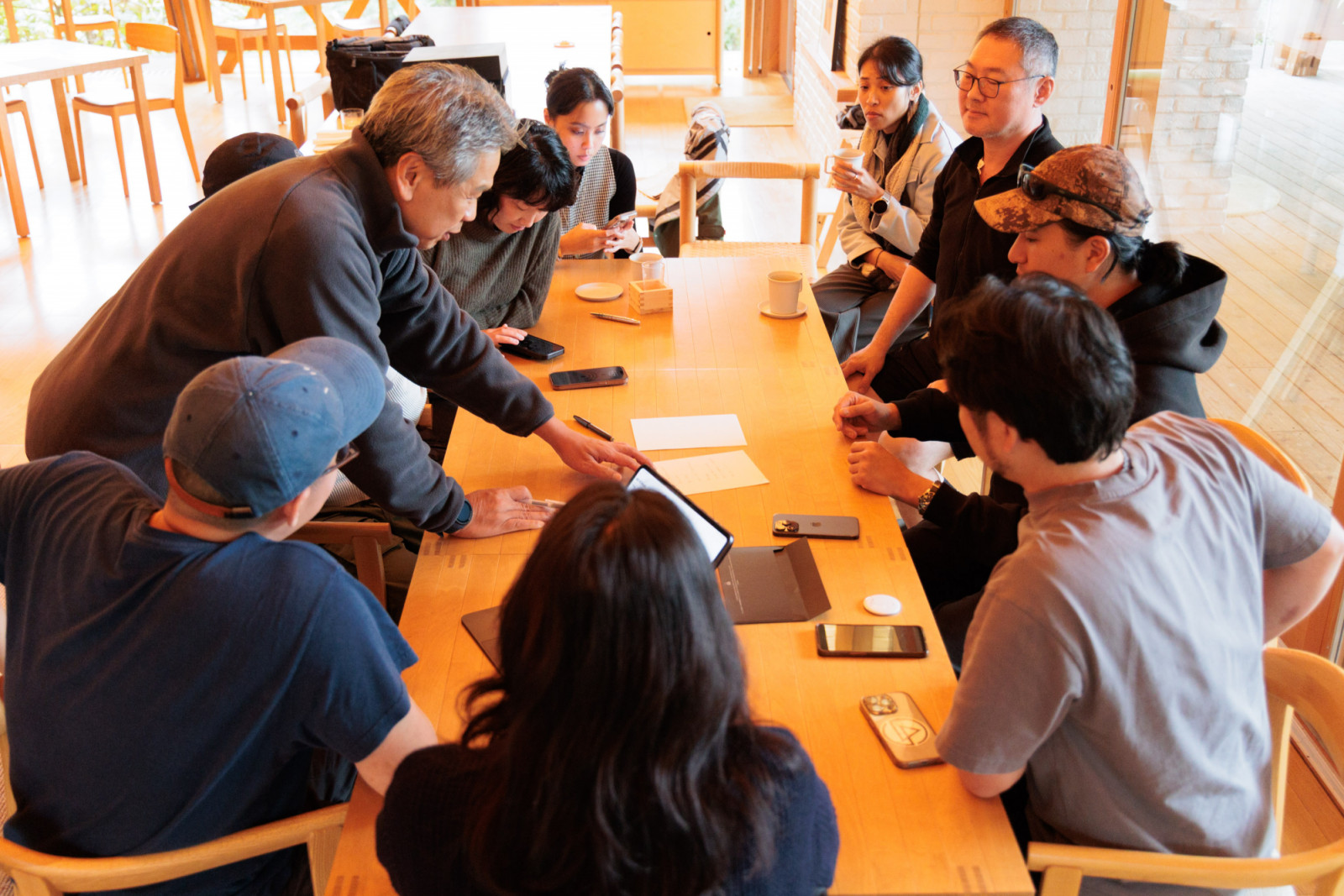 With just a few hours to go, the chefs gather around the table to discuss their collaboration dinner menu