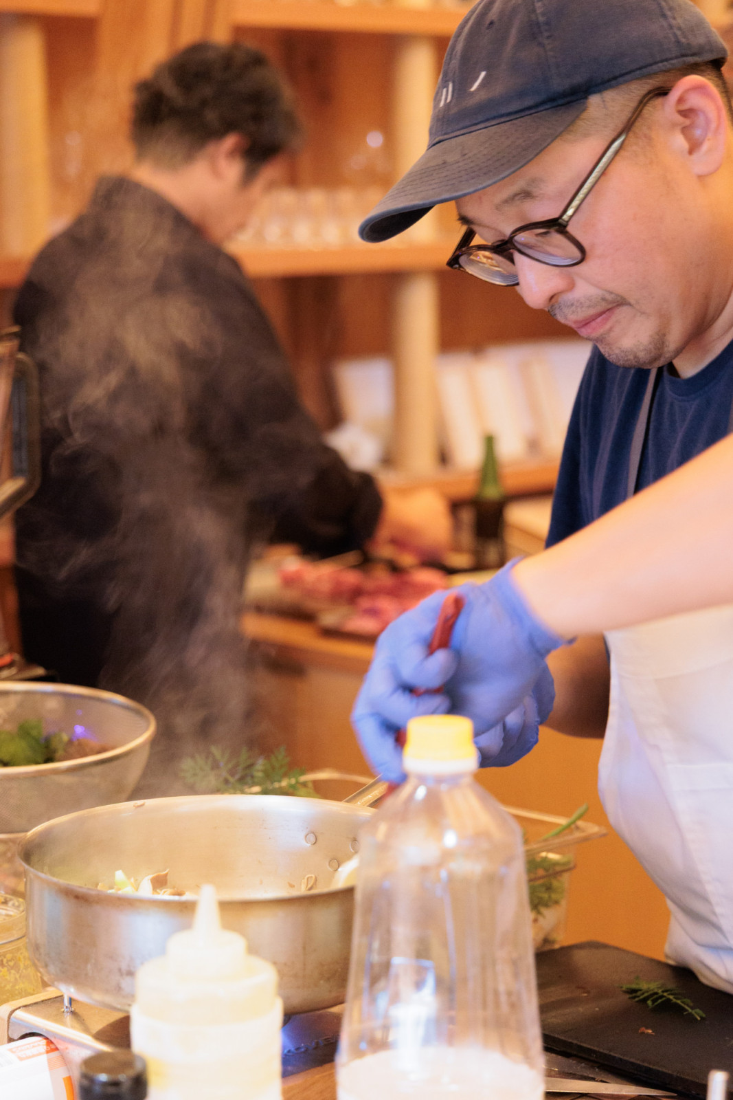 Chef Kwang Uh sweats out the vegetables for his bibimbap and trash sauce