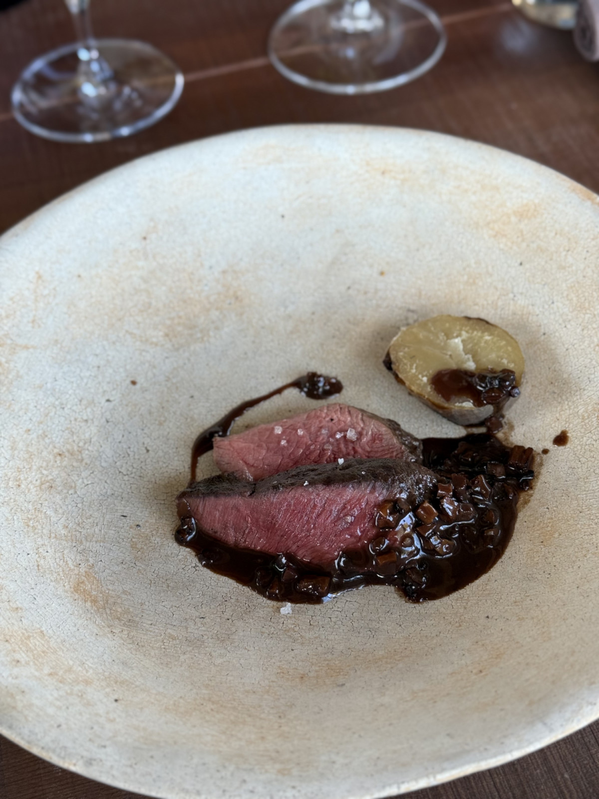 Venison served with a sauce of red wine and mushrooms, plus an aged year-old potato from Song restaurant (photo: Lauren Golangco)