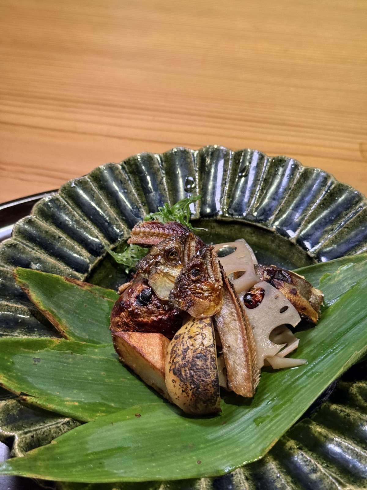 Pregnant Ayu served with its fried bones and head, plus a sweet, jammy fig at Kuroiwa Muni (photo: Lauren Golangco)