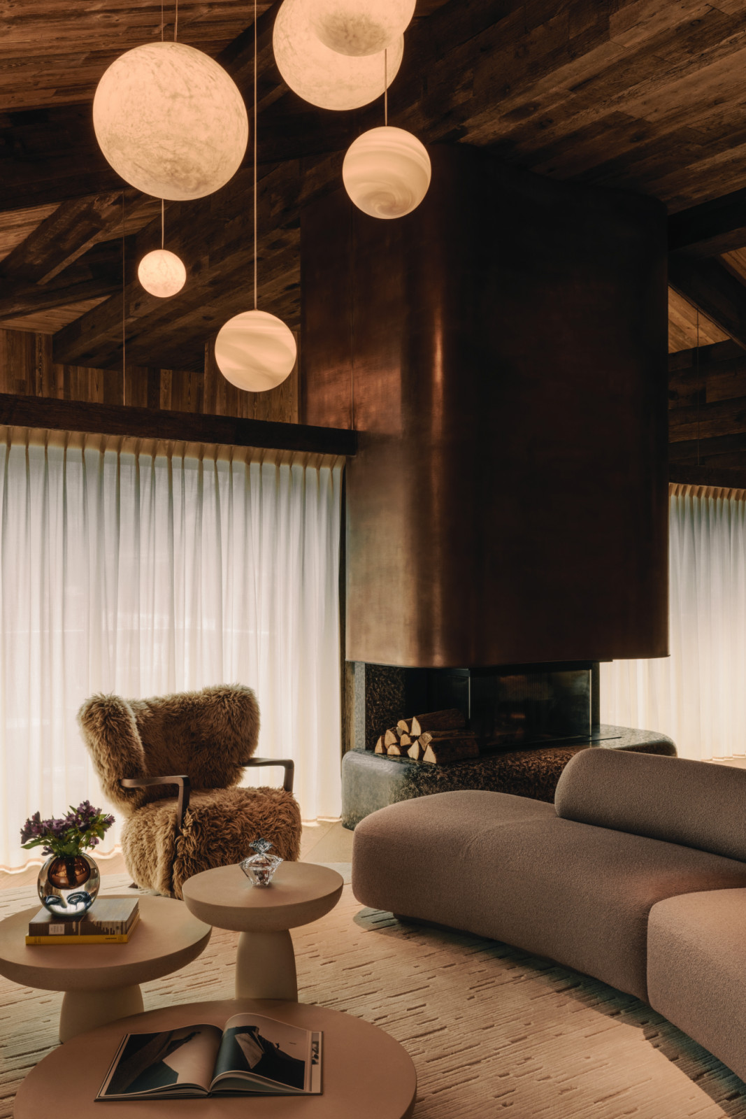 Designer Tristan Auer brings his signature tactile style to the property’s 51 rooms and suites, combining natural materials with copper accents and mirrored surfaces. (Photo: Rosewood)