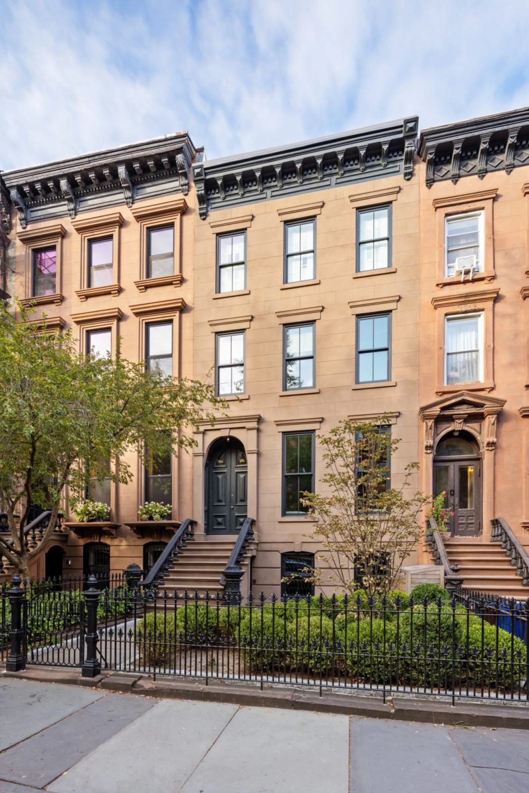 The late-19th-century brownstone at 381 Union Street in Carroll Gardens features a 22-foot-wide facade with original architectural details. (Photo: The Gambino Group)