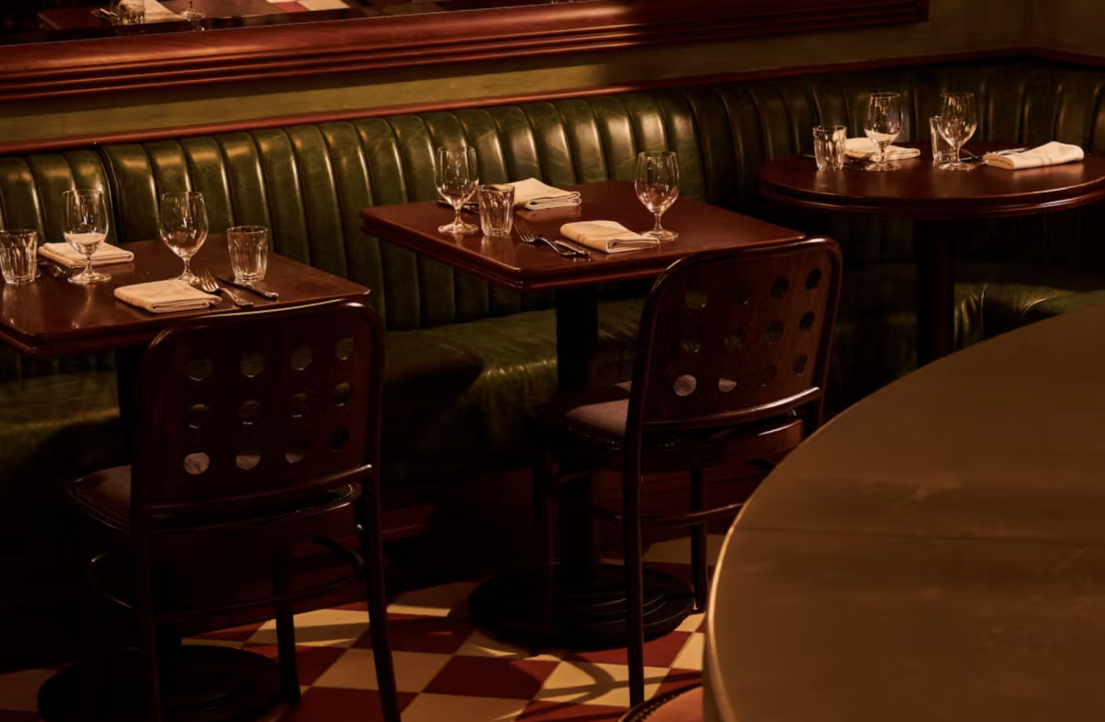 Set inside the historic Cherry Lane Theatre, Wild Cherry features vintage-inspired design with green banquettes, chequerboard floors and warm lighting, creating a relaxed, intimate atmosphere (Photo: Wild Cherry NYC)