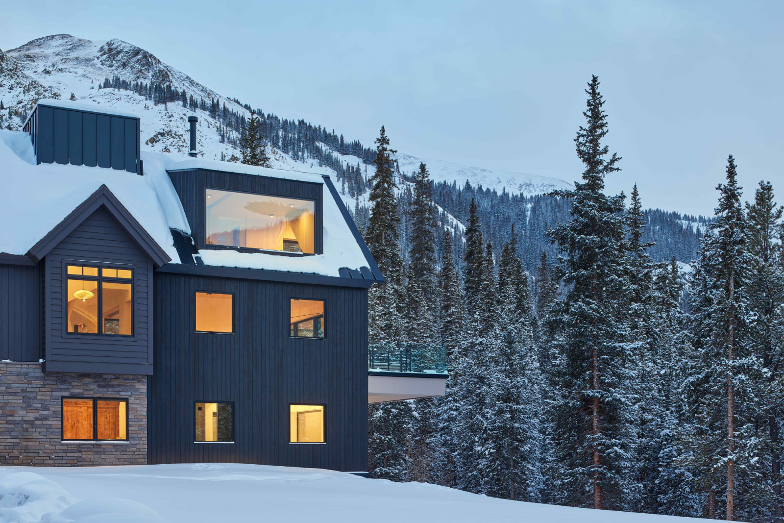The striking silhouette of the dark textured shou sugi ban enhances solar performance and provides fire resistance