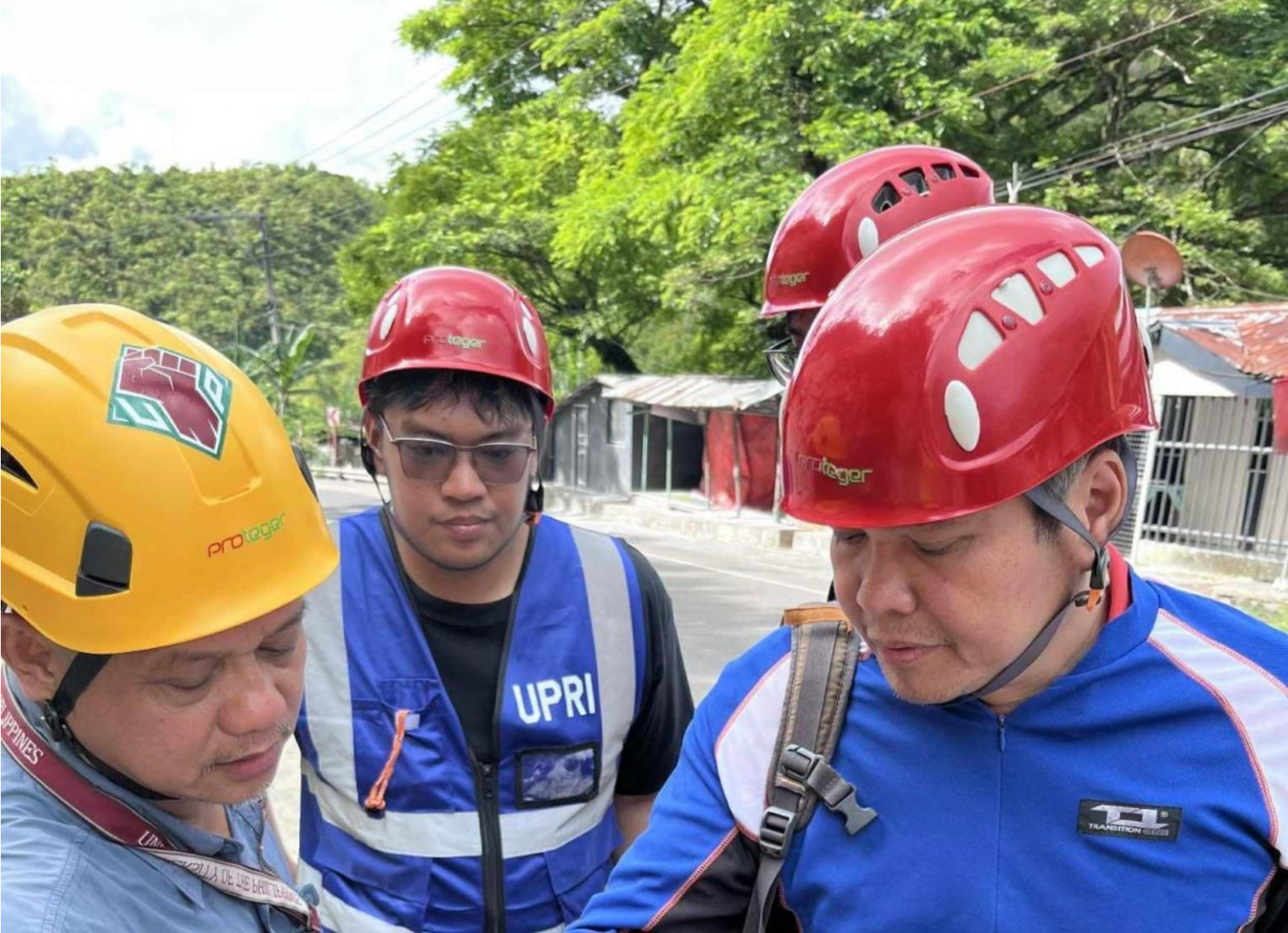 Right to left: Dr Mario Aurelio, Mark Forneste, Cristan Malaiba, and Dr  Mahar Lagmay, members of the University of the Philippines Geology Team (Photo: Courtesy of Alfredo Mahar Lagmay)