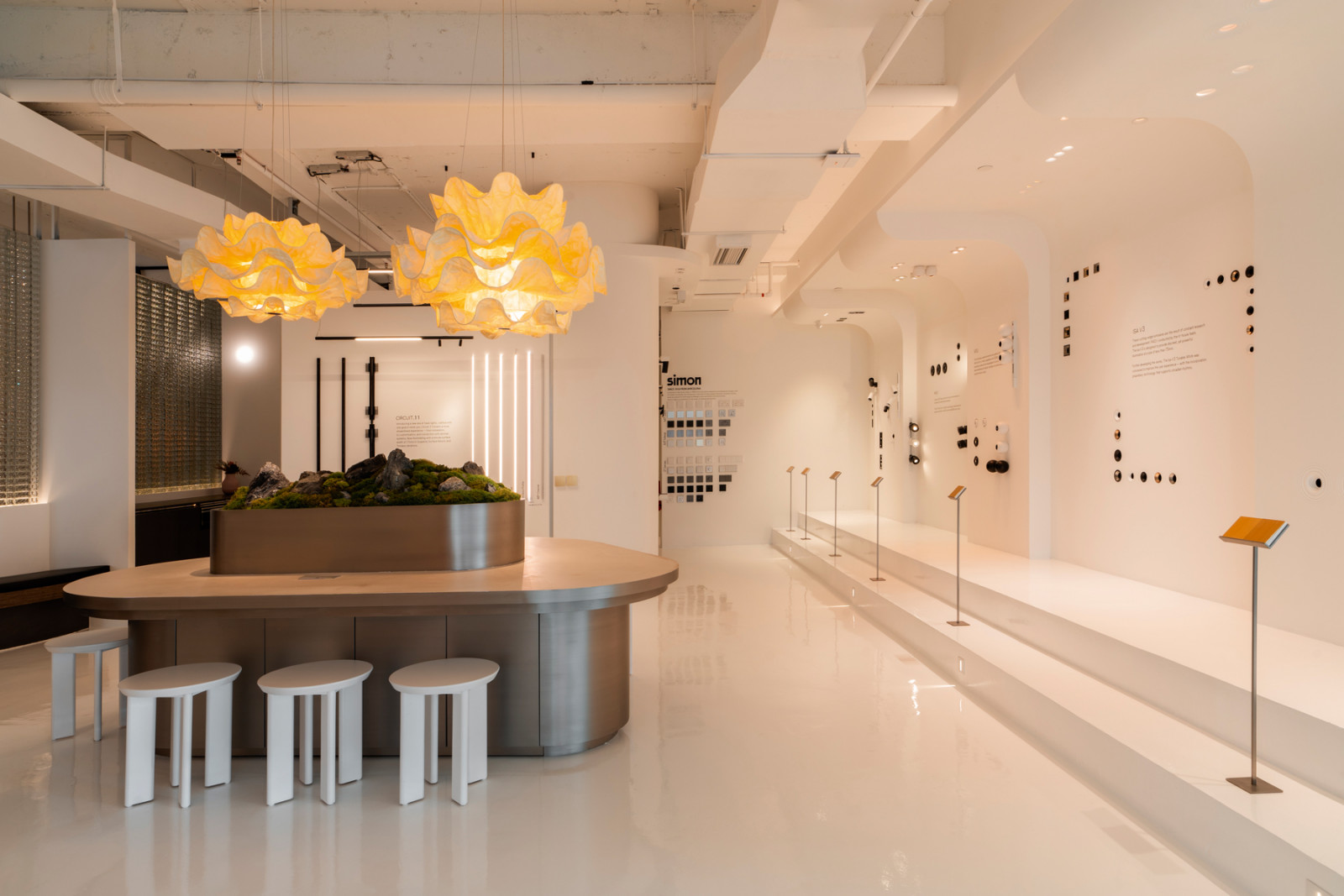 A Soilboy moss garden embedded in a custom table at Rooms by Sol Luminaire