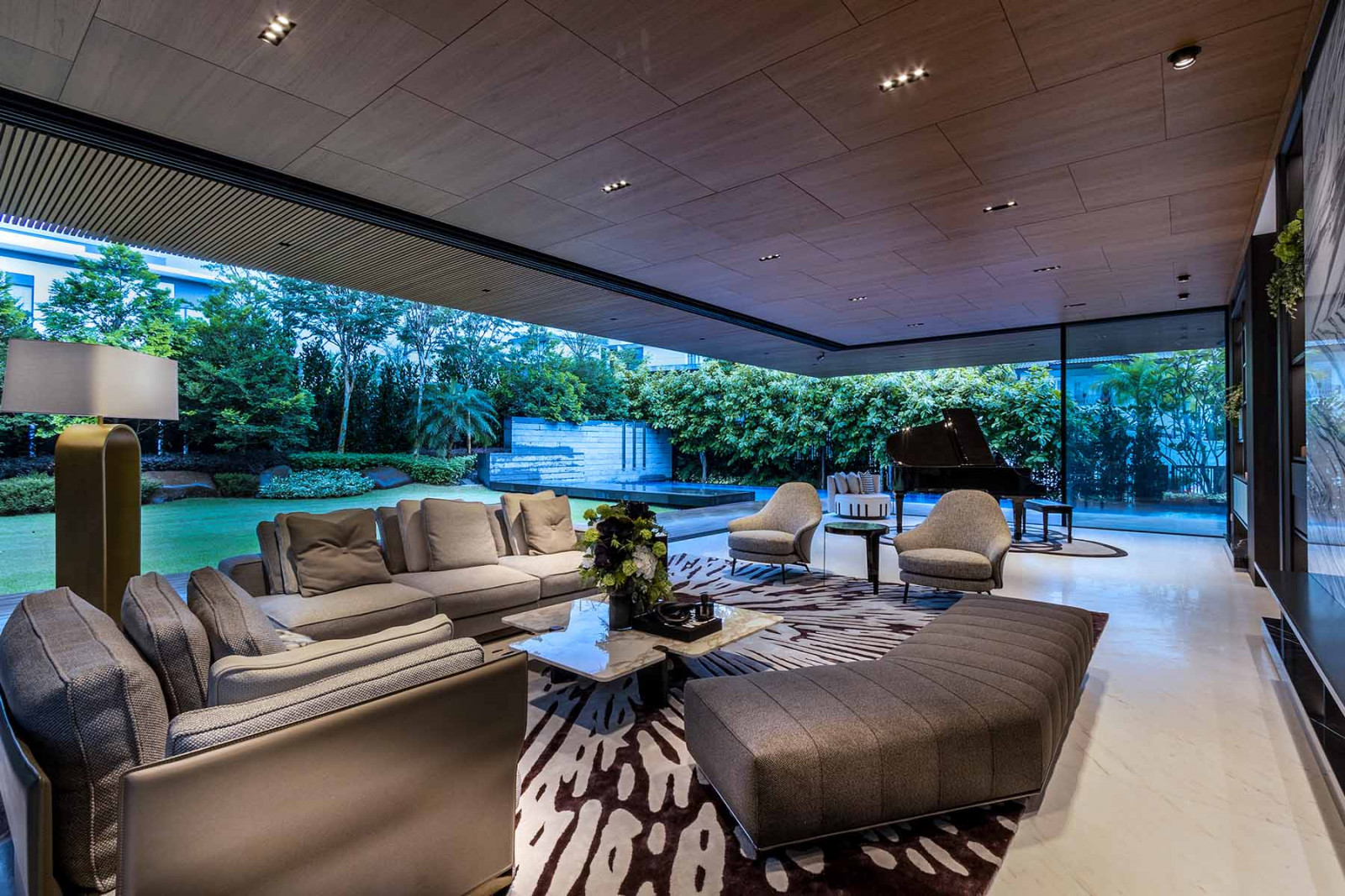 An expansive living room in a Tanglin GCB put together by SuMisura featuring Minotti pieces