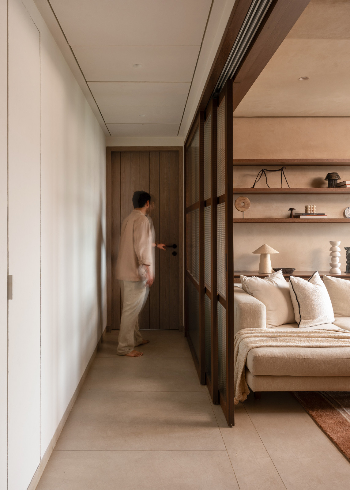 The hallway in a Mumbai, India home by Pill Design Studio