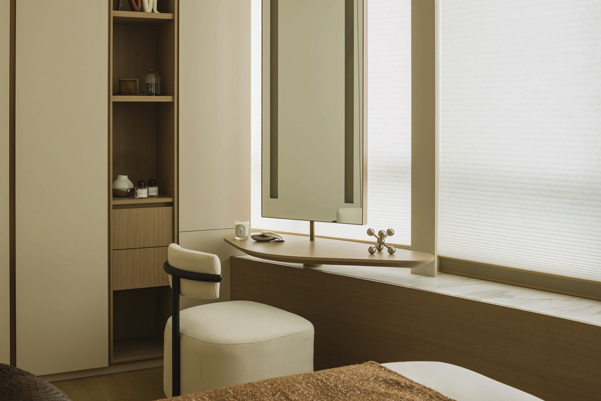 This sculptural vanity table and seat jazz up the wife’s daily personal grooming routine