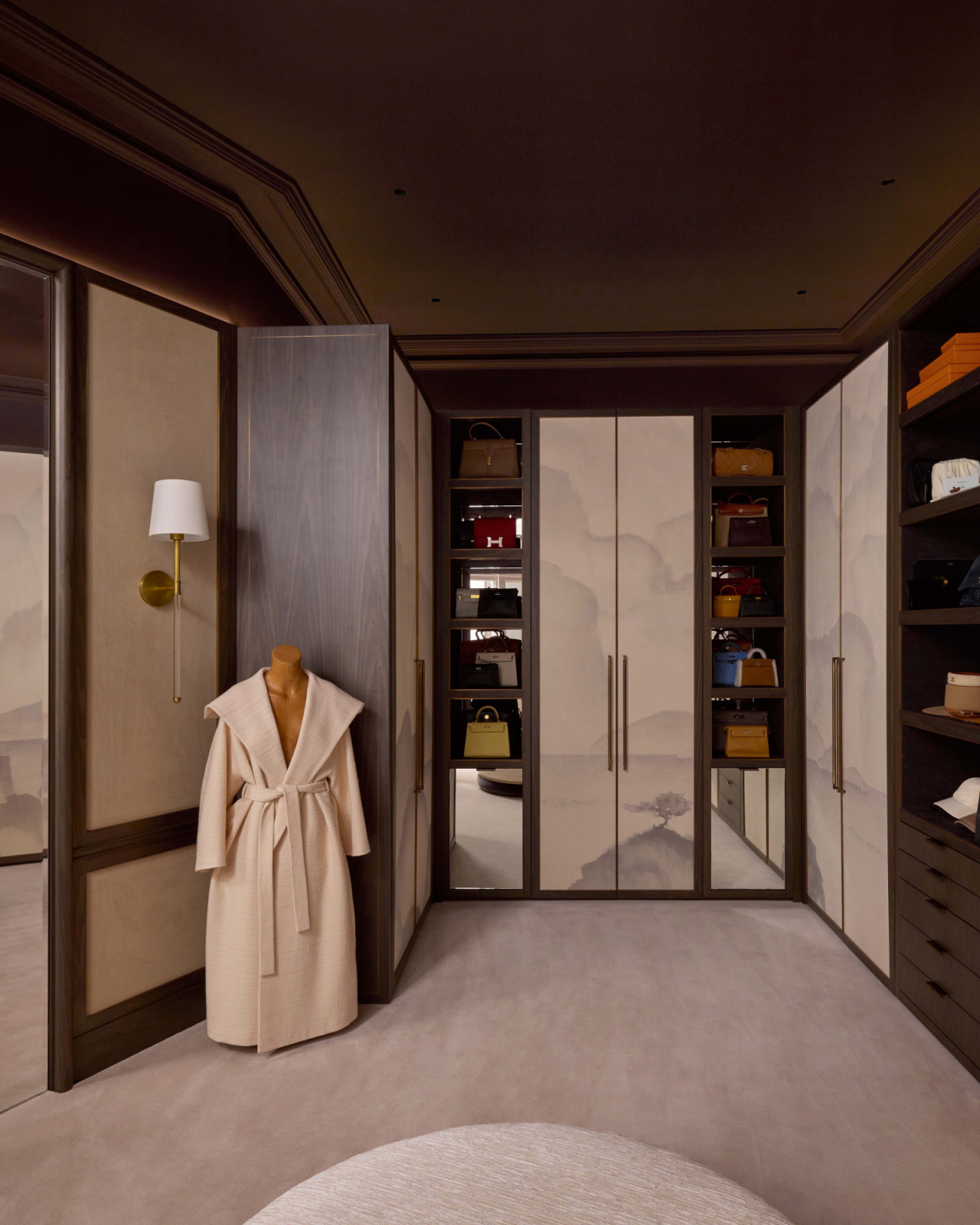 The walk-in closet of a home in London's OWO Residences, designed by Deseesion Interiors