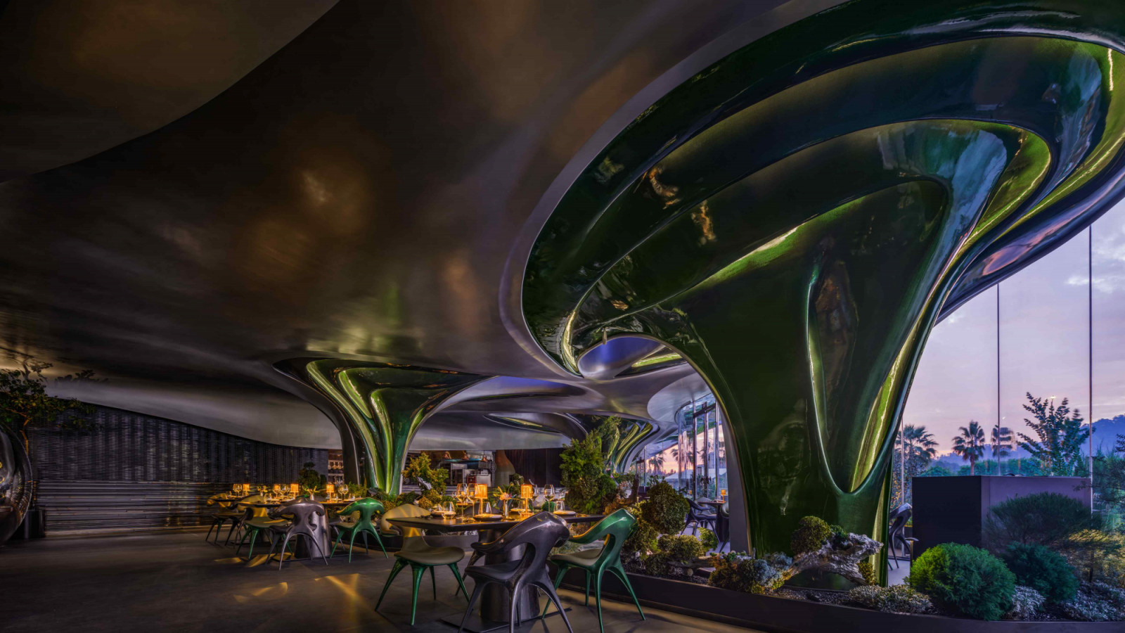 Designed by Republic Metropolis Architecture (RMA), the Nansha-based Suparnin is a garden-like restaurant by day, and programmed bar by night