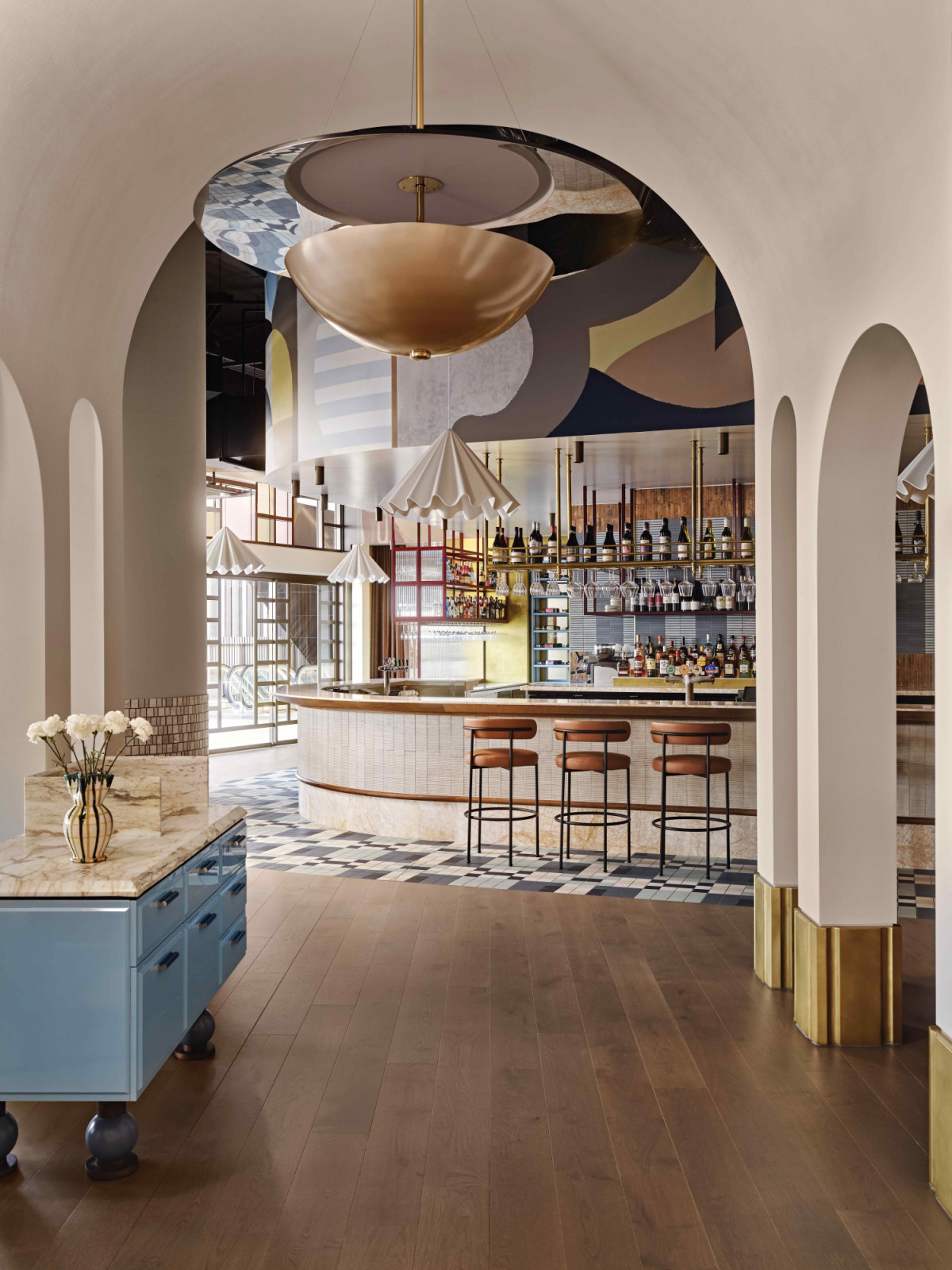 Both serious and playful, with cool tones and thoughtful materials