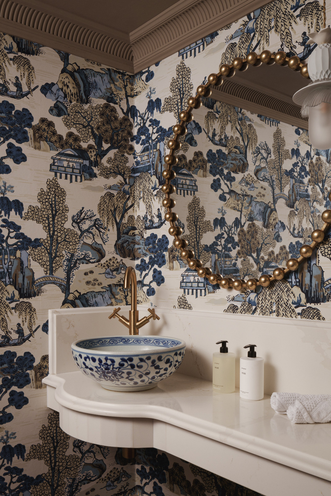 Dynamic textures in the powder room of a Hertfordshire, England property designed by Vastu Interior Design to include elements of Vastu Shastra, India's ancient architectural science
