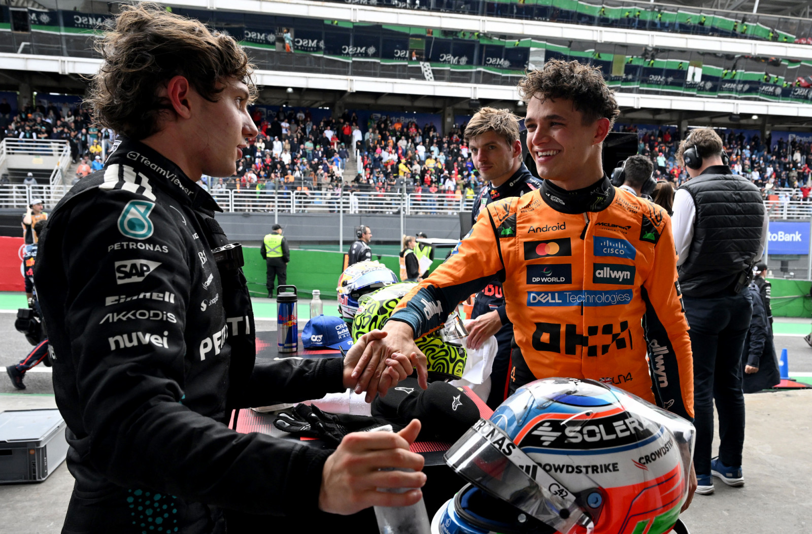 SAO PAULO, BRAZIL - NOVEMBER 09: Race winner Lando Norris of Great Britain and McLaren and Second placed Andrea Kimi Antonelli of Italy and Mercedes AMG Petronas F1 Team talk in parc ferme during the F1 Grand Prix of Brazil at Autodromo Jose Carlos Pace on November 09, 2025 in Sao Paulo, Brazil. (Photo by Mark Sutton - Formula 1/Formula 1 via Getty Images)