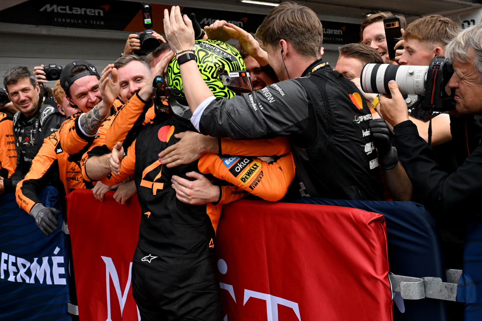SAO PAULO, BRAZIL - NOVEMBER 09: Race winner Lando Norris of Great Britain and McLaren celebrates in parc ferme with his team during the F1 Grand Prix of Brazil at Autodromo Jose Carlos Pace on November 09, 2025 in Sao Paulo, Brazil. (Photo by Mark Sutton - Formula 1/Formula 1 via Getty Images)