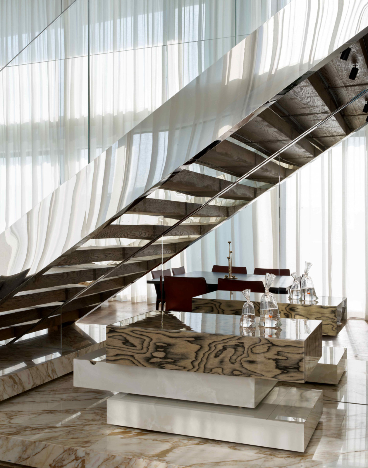 The custom-made under-stair storage made of marble