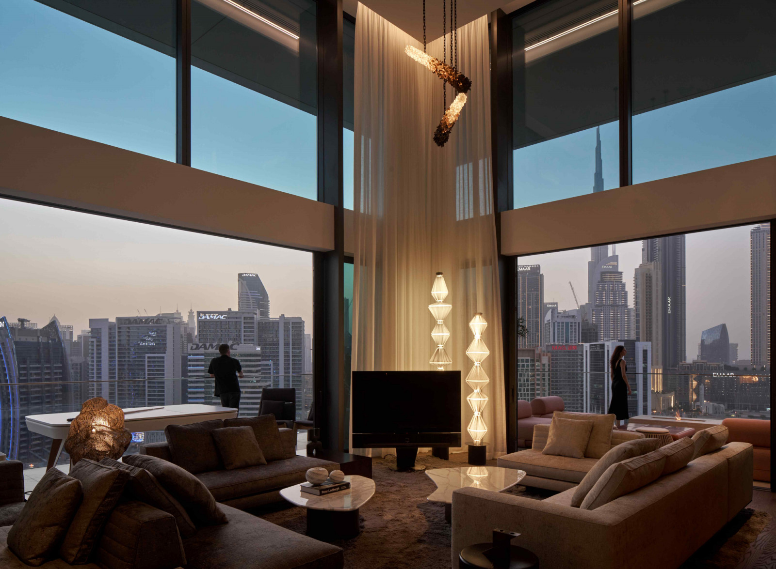 Christopher Boots’ custom lighting fixture illuminates the living room