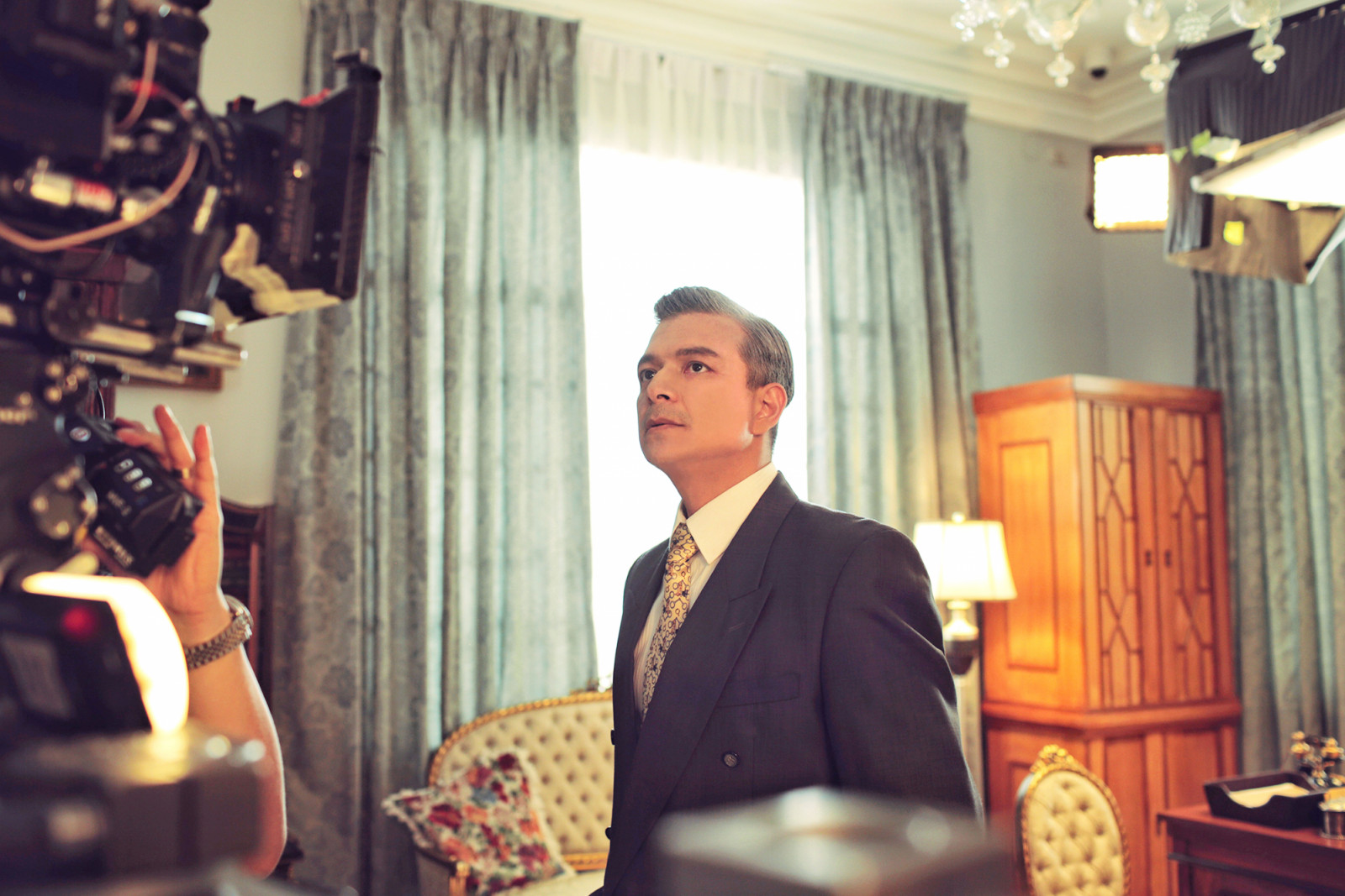 Jericho Rosales steps into the role of Manuel Quezon, capturing the statesman's poise and conviction on set (Photo: Pong Ignacio and Trixie Vertera)