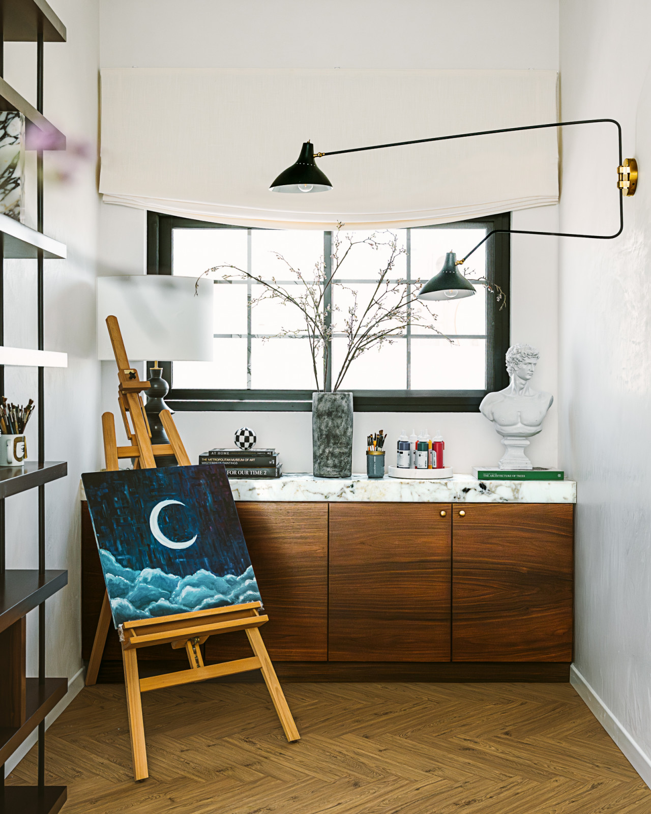 A light-filled artist's studio by Qreative Design Studio at a family home in Muharraq, Bahrain