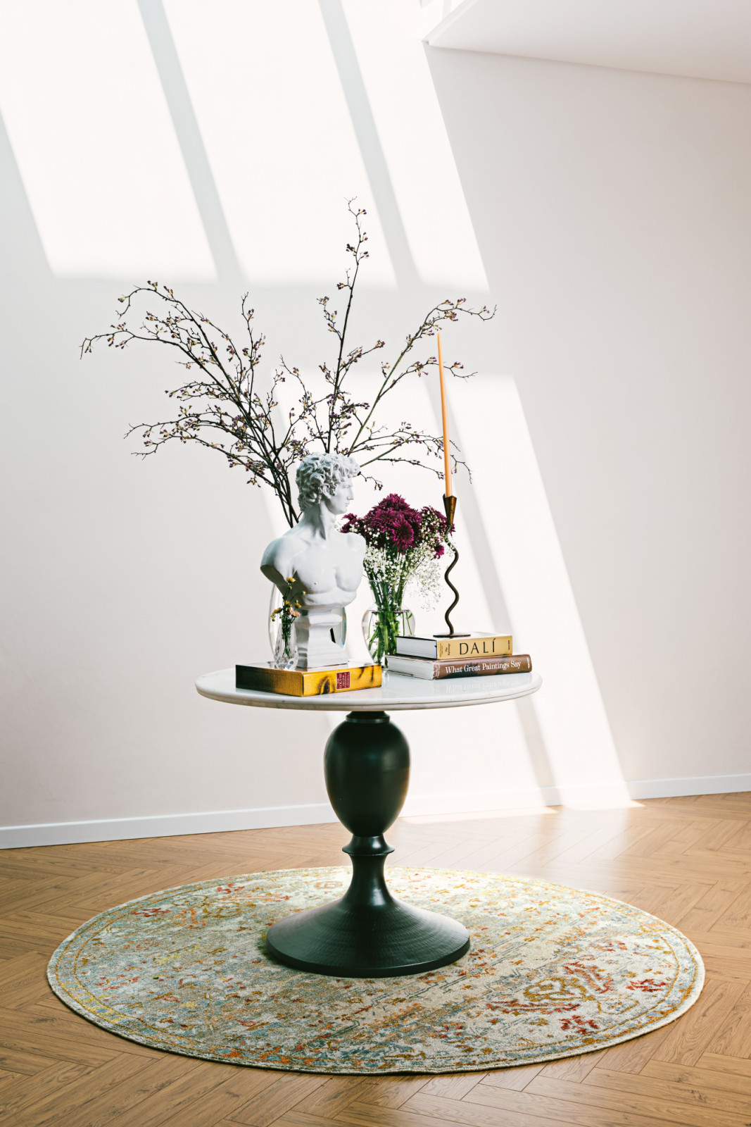 The light-filled entryway of a home revamped by Qreative Design Studio at a family home in Muharraq, Bahrain