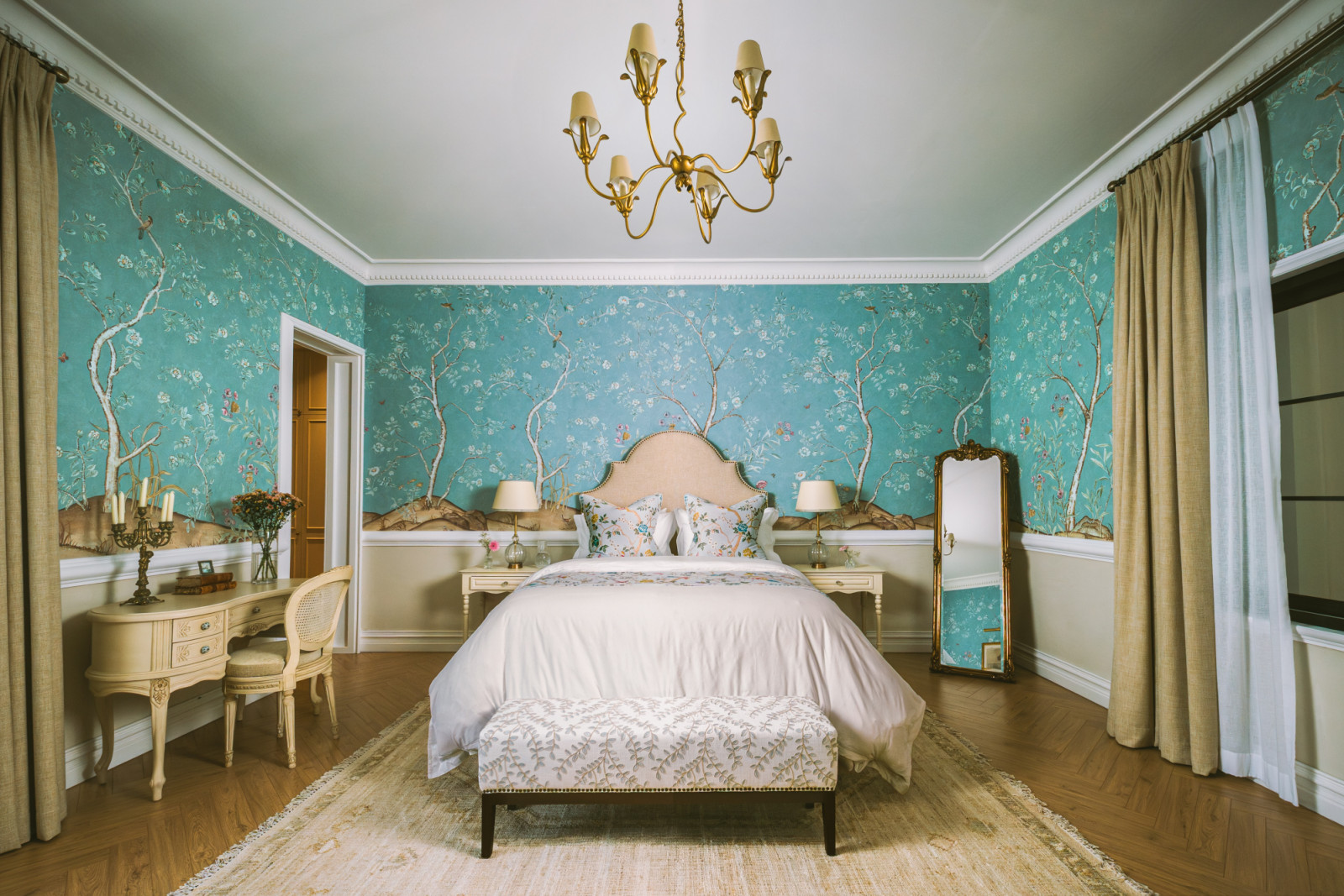 A secondary bedroom with fairytale hues of blues and greens by Qreative Design Studio at a family home in Muharraq, Bahrain