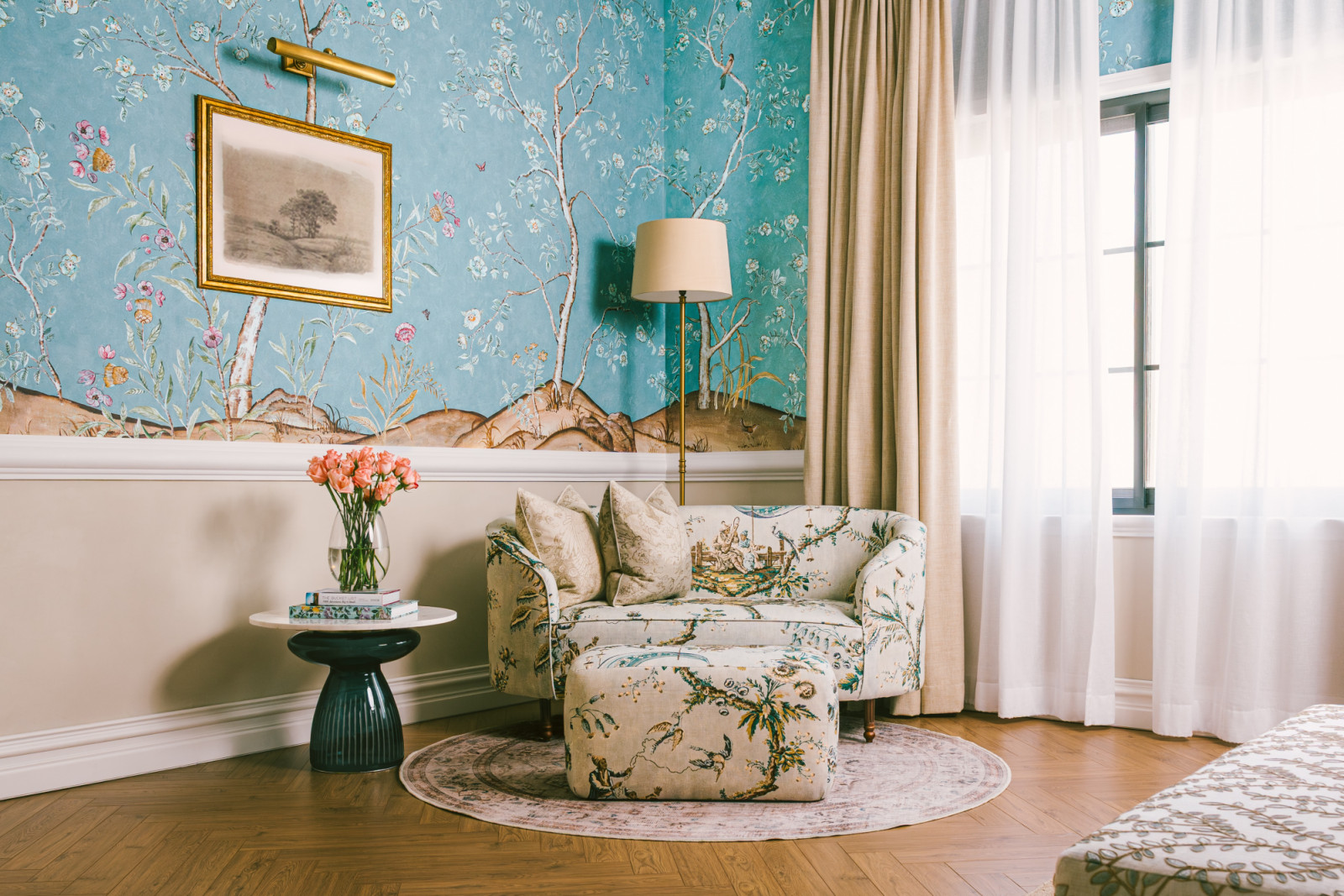 The sitting area in one of the bedrooms renovated by Qreative Design Studio at a family home in Muharraq, Bahrain