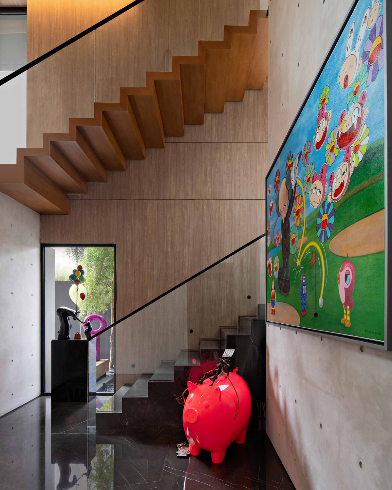 Playful artwork add pops of colour to the Pondok Indah home’s interior