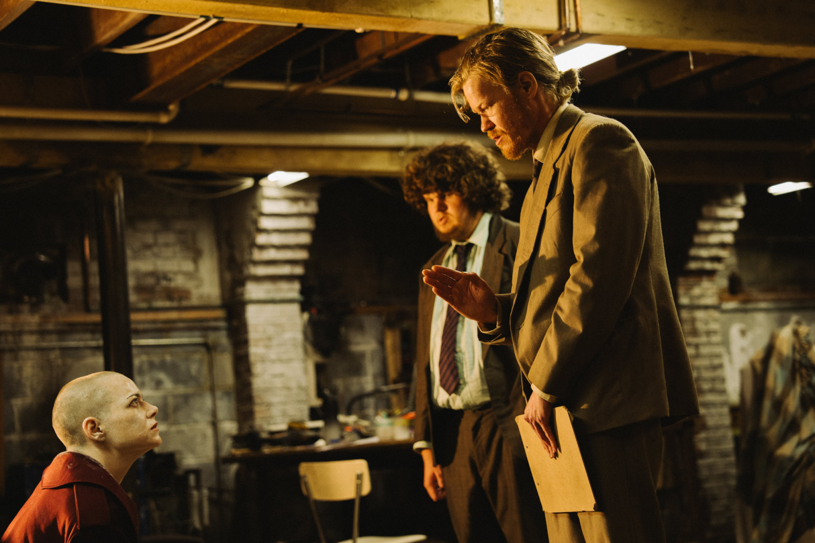 Teddy (Jesse Plemons) and Don’s (Aidan Delbis) first conversation with Michelle Fuller (Emma Stone) in Yorgos Lanthimos’s ‘Bugonia’ (Photo: courtesy of Universal Pictures)
