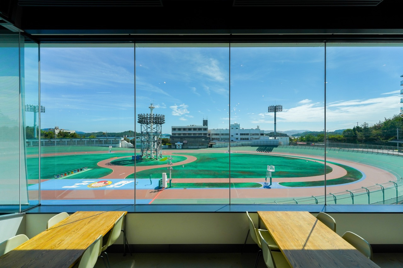 Restaurant seating overlooks the velodrome track