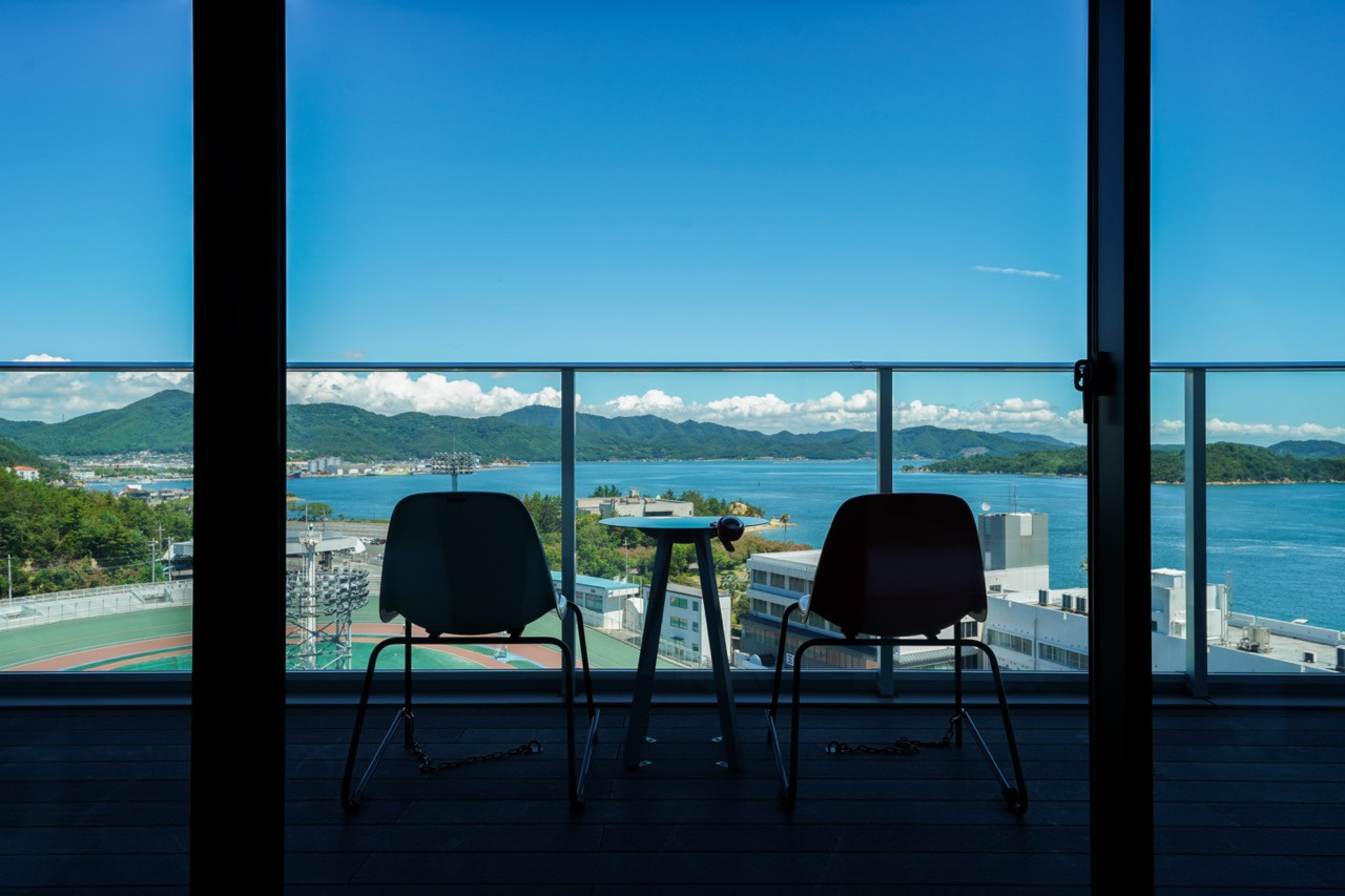 The hotel repurposes salvaged steel, concrete and seating from the velodrom