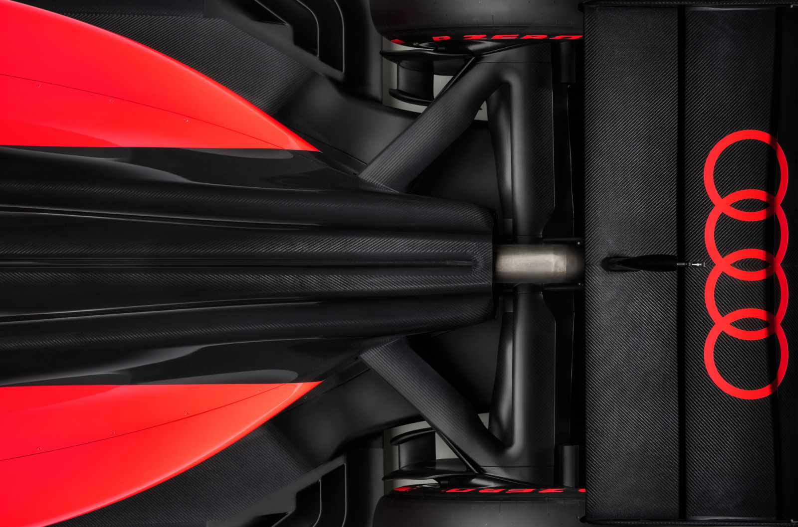 Indoor studio shot, exterior, bird’s-eye view, detail of rear section and rear wing