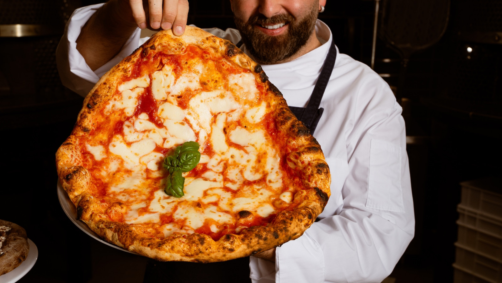 Chef-owner Vincenzo Capuano, with his pizzeria’s signature margherita pizza