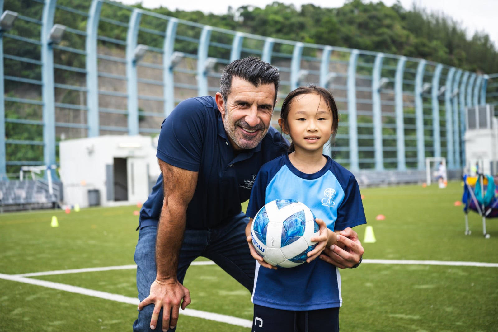 Barcelona football legend Luis Figo supporting Laureus Sport for Good's Hong Kong youth programmes