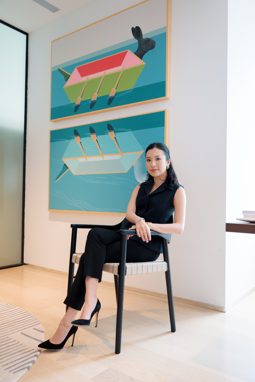 Lifelong art lover: Rachel Yeoh seated against a masterpiece by pop realism artist Hisyamuddin Abdullah (Photo: Fady Younis)