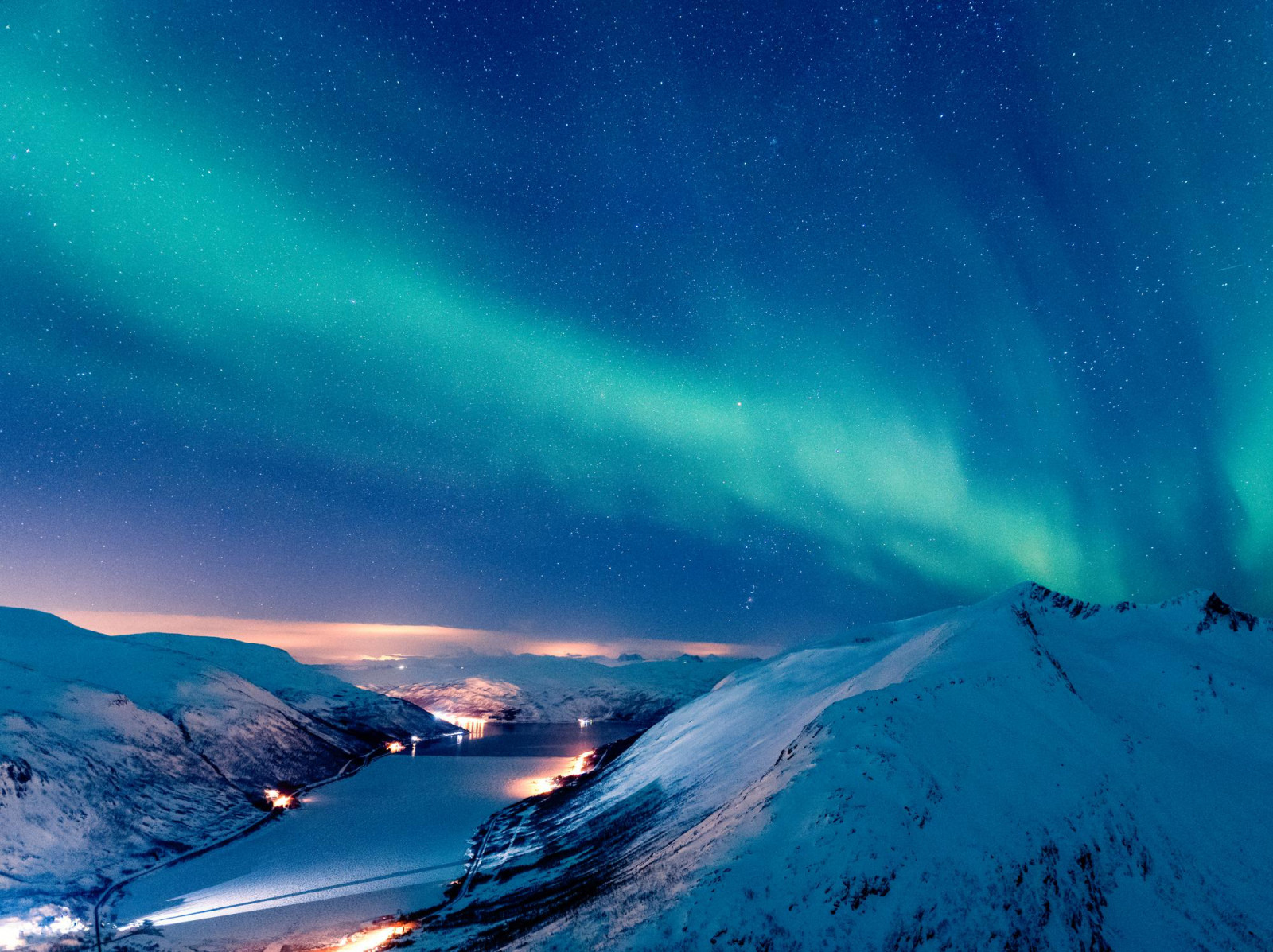 From the Arctic fjords of Norway to the high islands of Nunavut, these regions spend winter under extended twilight, shaping daily life and travel in unique ways (Photo: Wirestock)