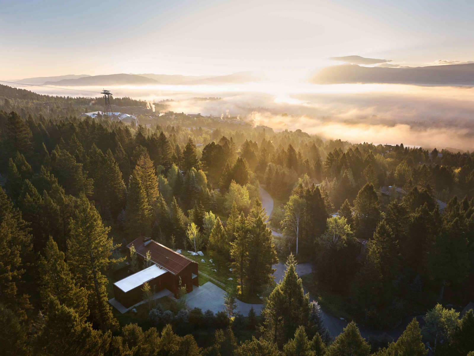 Caju Residence is tucked into the forested slopes of Teton Village, Wyoming