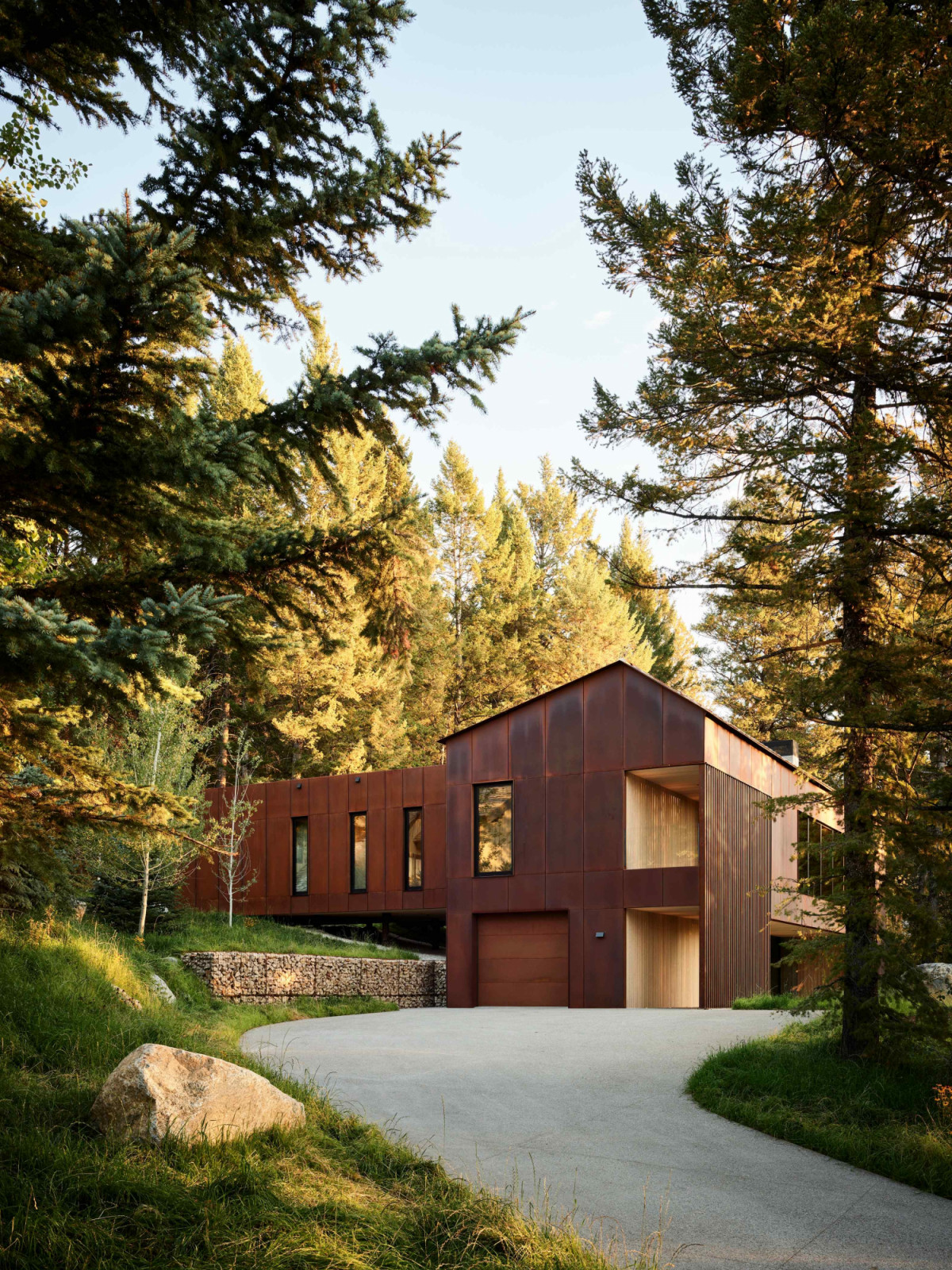The asymmetrical gable subtly nods to the region’s alpine vernacular