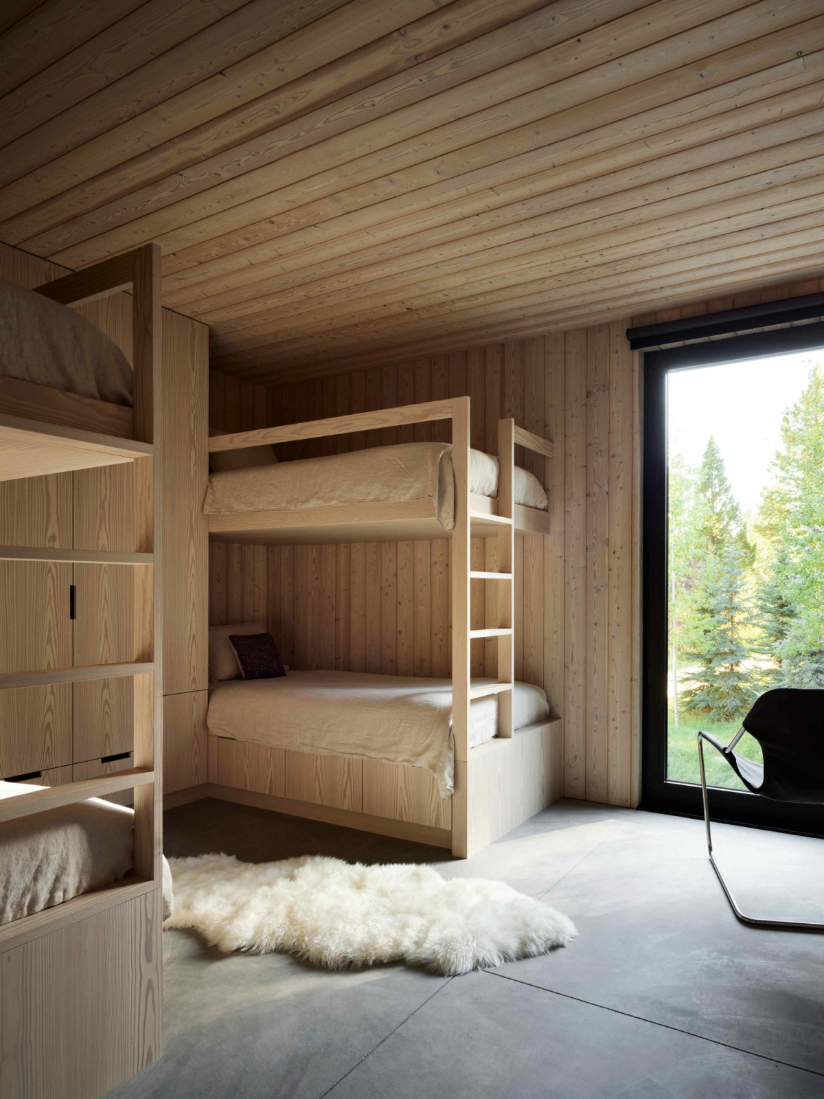 One of the four bedrooms with bunk beds for guests