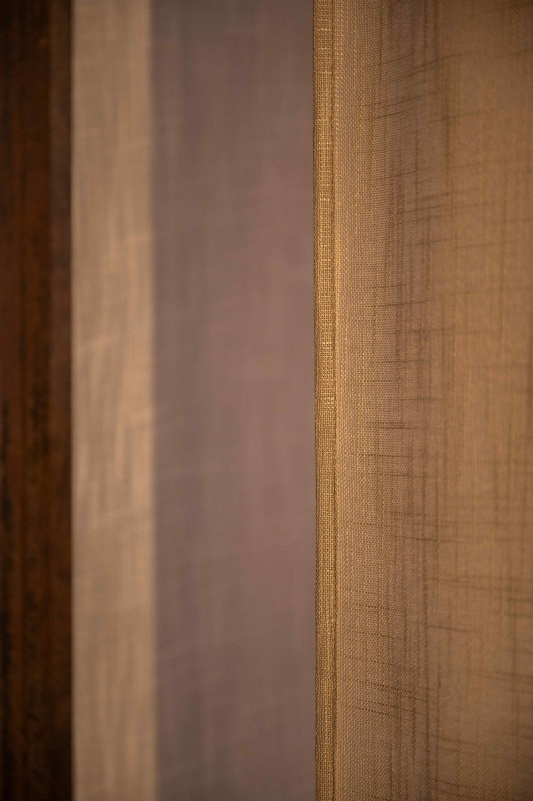Bespoke fabric screens paired with soft lighting act as porous partitions (Photo: TML Production)