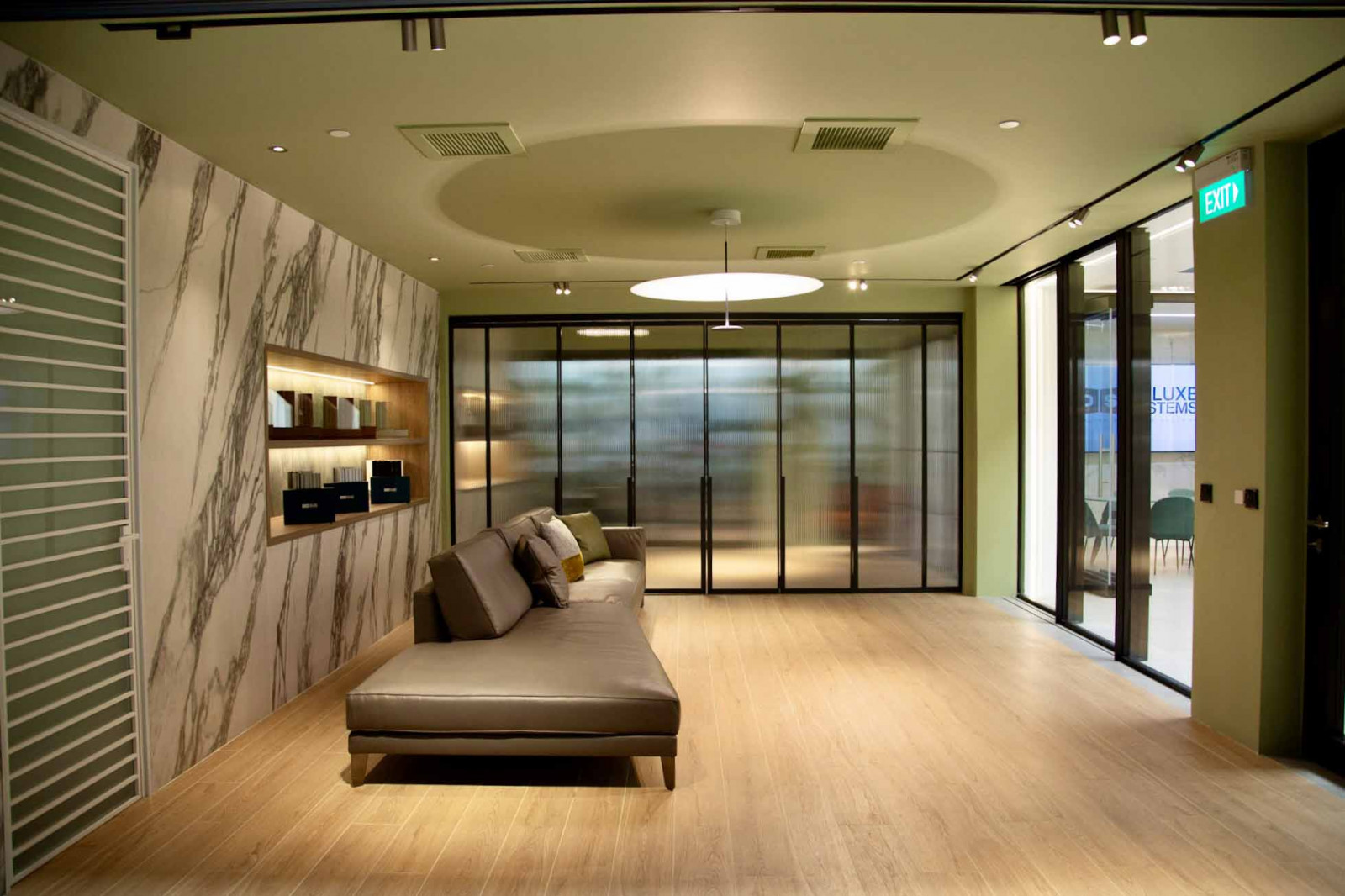 Fluted folding doors separate the living room from the patio