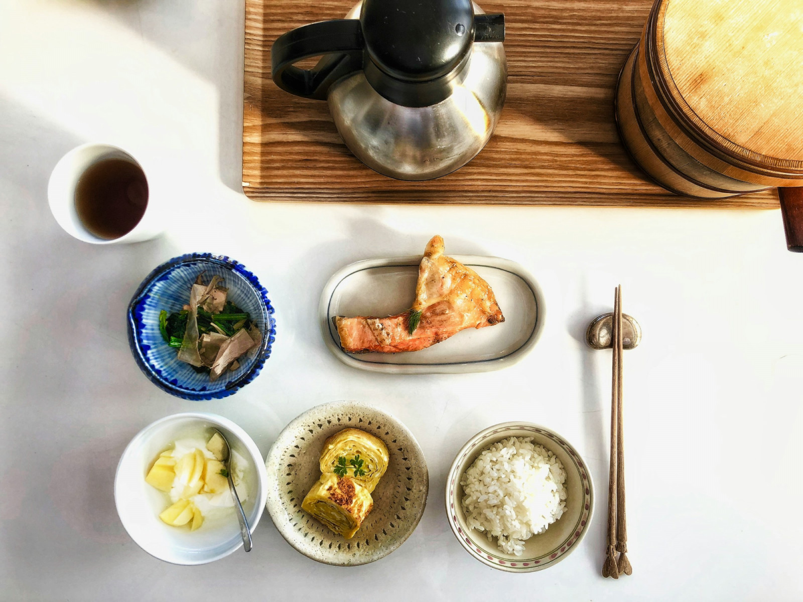 A traditional Japanese breakfast combines grilled fish, miso soup, rice and pickles, balancing flavours and nutrients for a measured start to the day (Photo: 逸 韩/Unsplash)