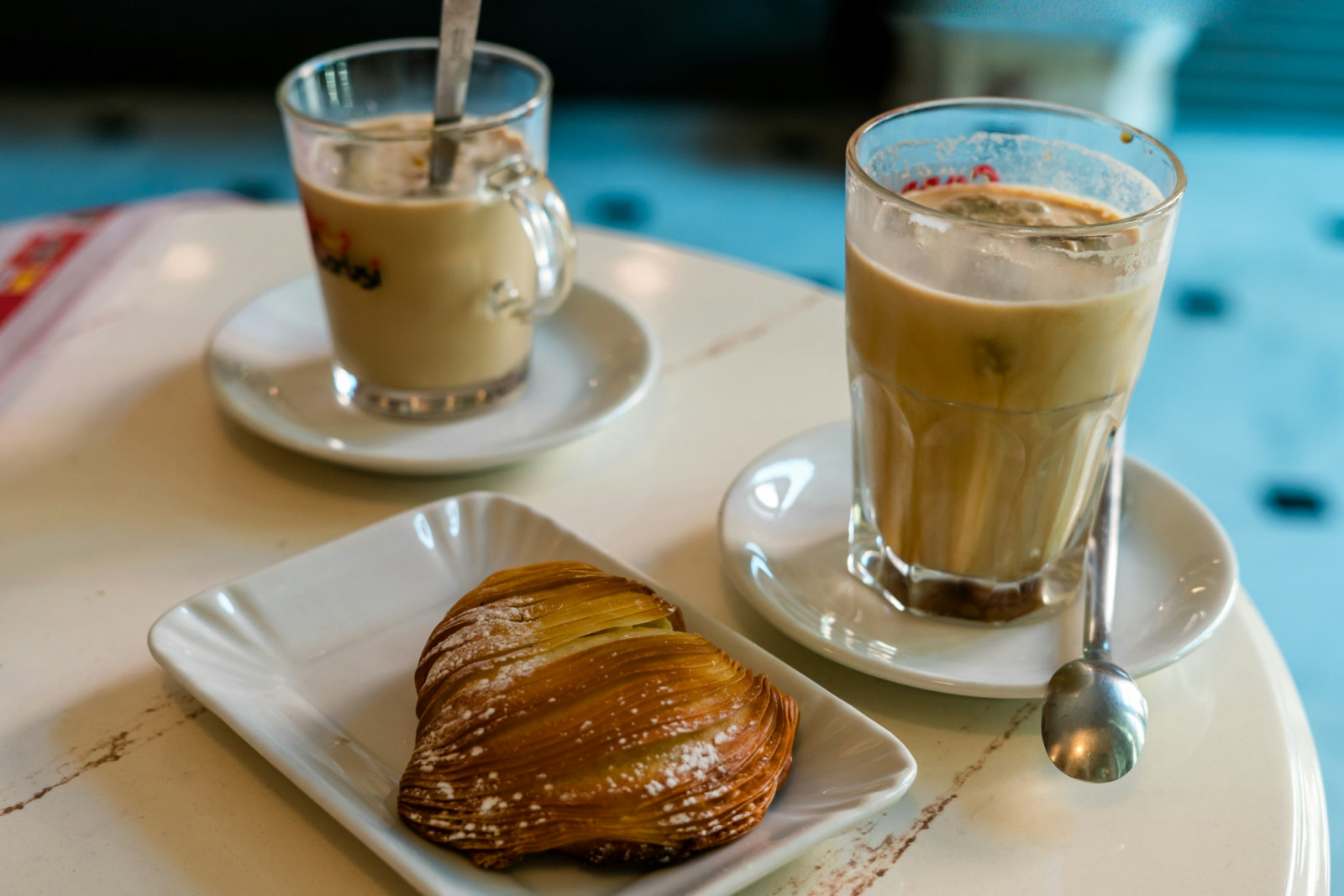 Sfogliatella and rum-soaked babà showcase centuries of pastry craft rooted in Neapolitan history and local ingredients (Photo: Gabriella Clare Marino/Unsplash)