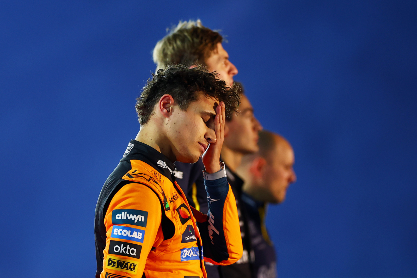 LAS VEGAS, NEVADA - NOVEMBER 22: Second placed Lando Norris of Great Britain and McLaren on the podium during the F1 Grand Prix of Las Vegas at Las Vegas Strip Circuit on November 22, 2025 in Las Vegas, Nevada. (Photo by Bryn Lennon - Formula 1/Formula 1 via Getty Images)