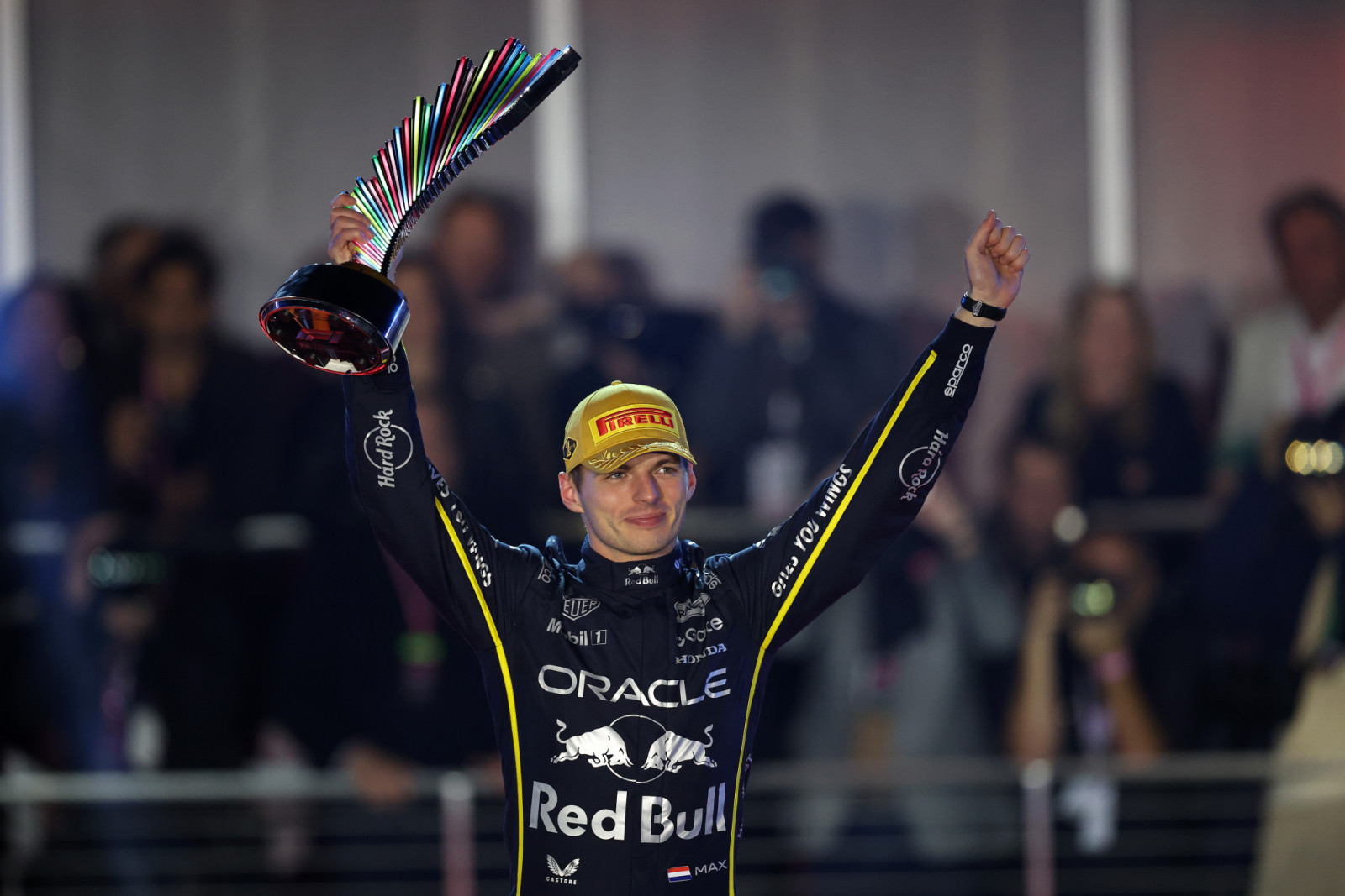 LAS VEGAS, NEVADA - NOVEMBER 22: Race winner Max Verstappen of the Netherlands and Oracle Red Bull Racing lifts his trophy on the podium during the F1 Grand Prix of Las Vegas at Las Vegas Strip Circuit on November 22, 2025 in Las Vegas, Nevada. (Photo by Chris Graythen/Getty Images)