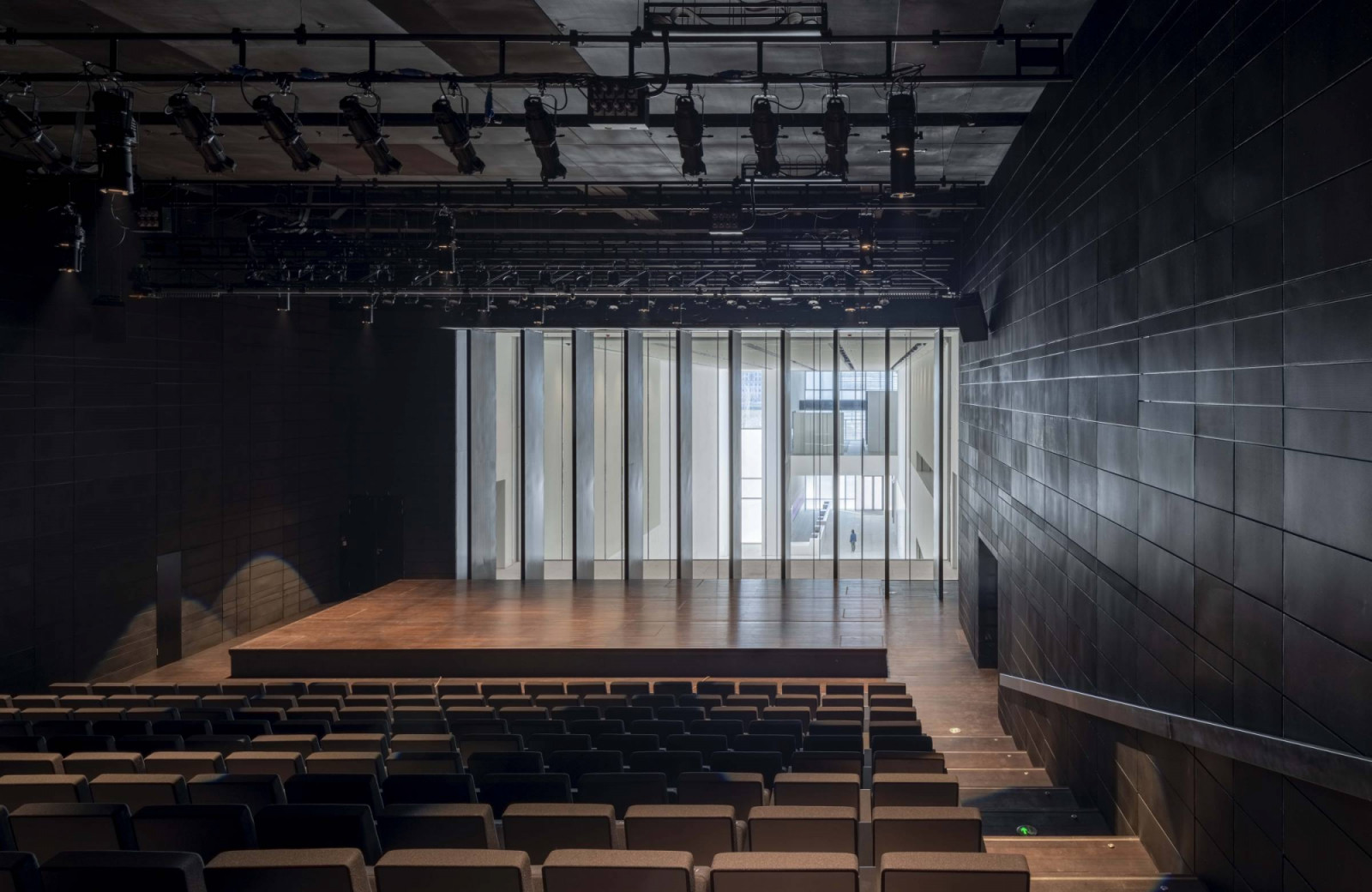 A 400-seat theatre occupies the museum’s lower level, providing space for performances, film screenings, and public programming (Photo: Chen Hao)