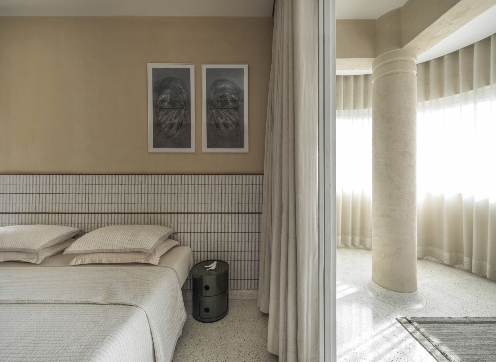The primary bedroom of a renovated Art Deco home by Studio UF+O in Mumbai, India