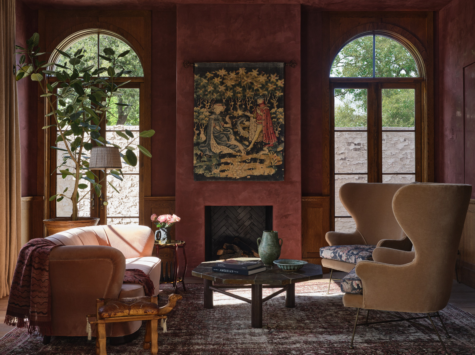 A jewel-toned parlour in a home designed by Shane & Pierce in Dallas, Texas